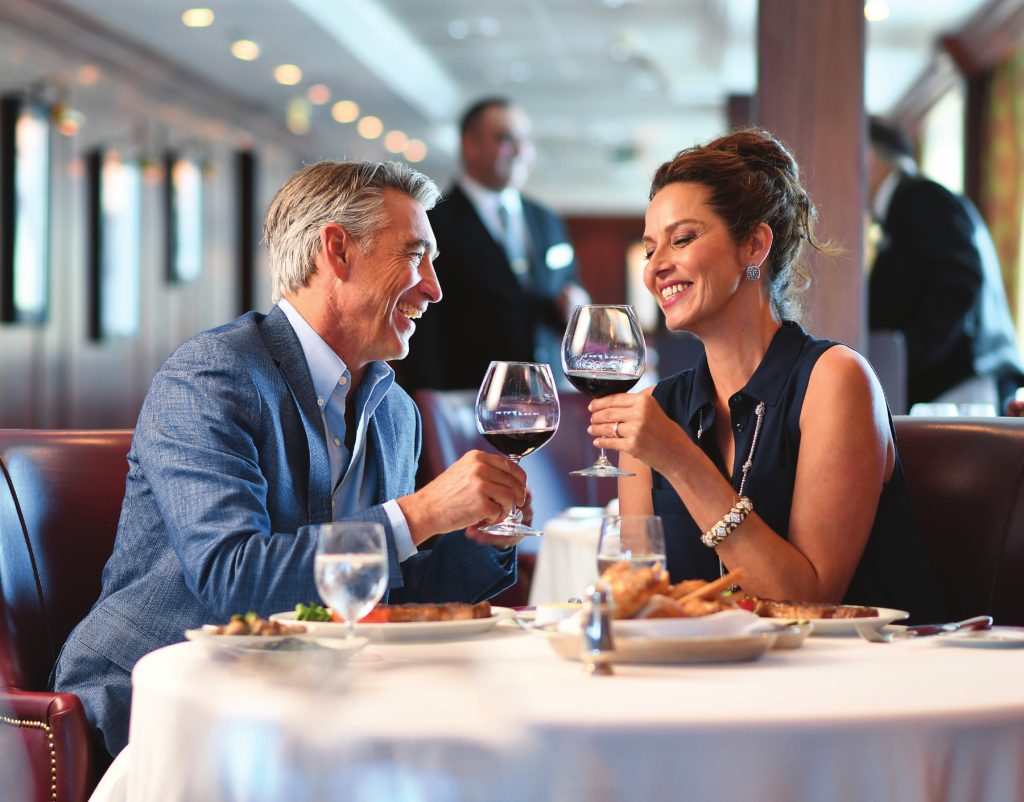 Couple dining on an Oceania cruise ship - Accent On Travel