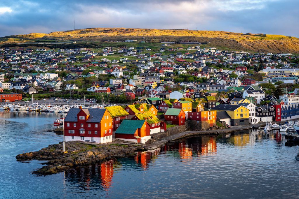 Sunrise scene of capital city Torshavn in Faroe Islands in North Atlantic - Accent On Travel 