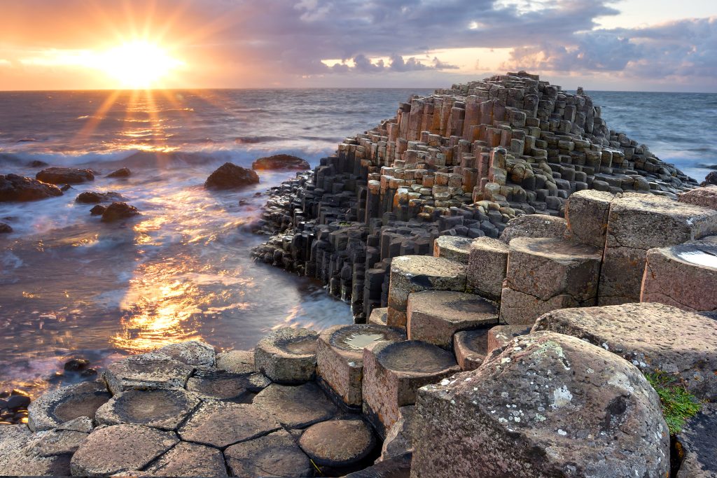 Sunset at the Giants Causeway, North Antrim, Northern Ireland - Accent On Travel