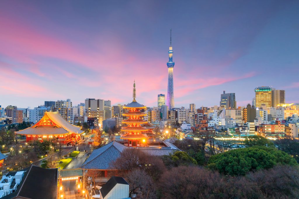 View of Tokyo skyline at sunset in Japan. - Accent On Travel