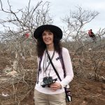 Lucy Day in front of a tree with Frigate birds - Accent on Travel