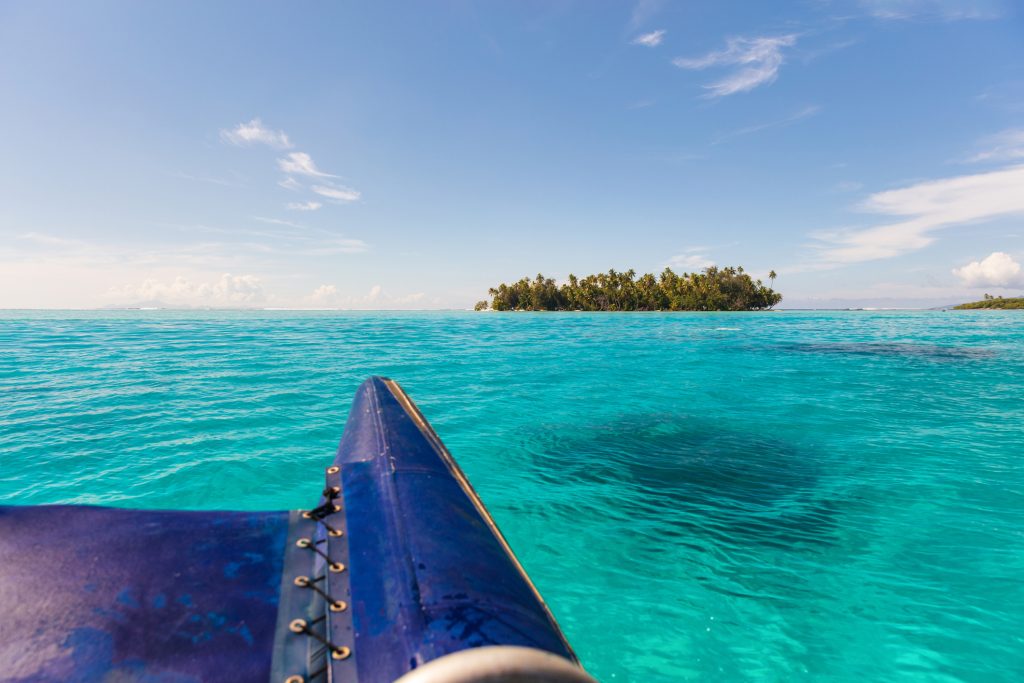 Boat excursion on catamaran going to private island in Bora Bora, Tahiti, French Polynesia