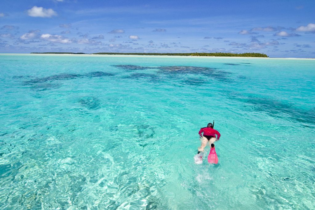 A woman snorkeling in the reefs - Accent on Travel